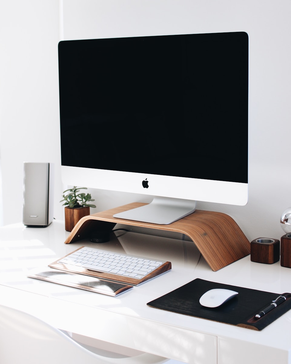 white iMac used for home-based businesses